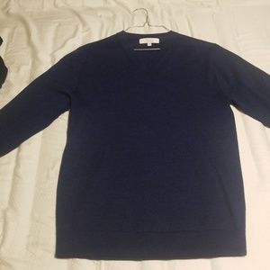 This is a extra fine merino wool navy blue sweater